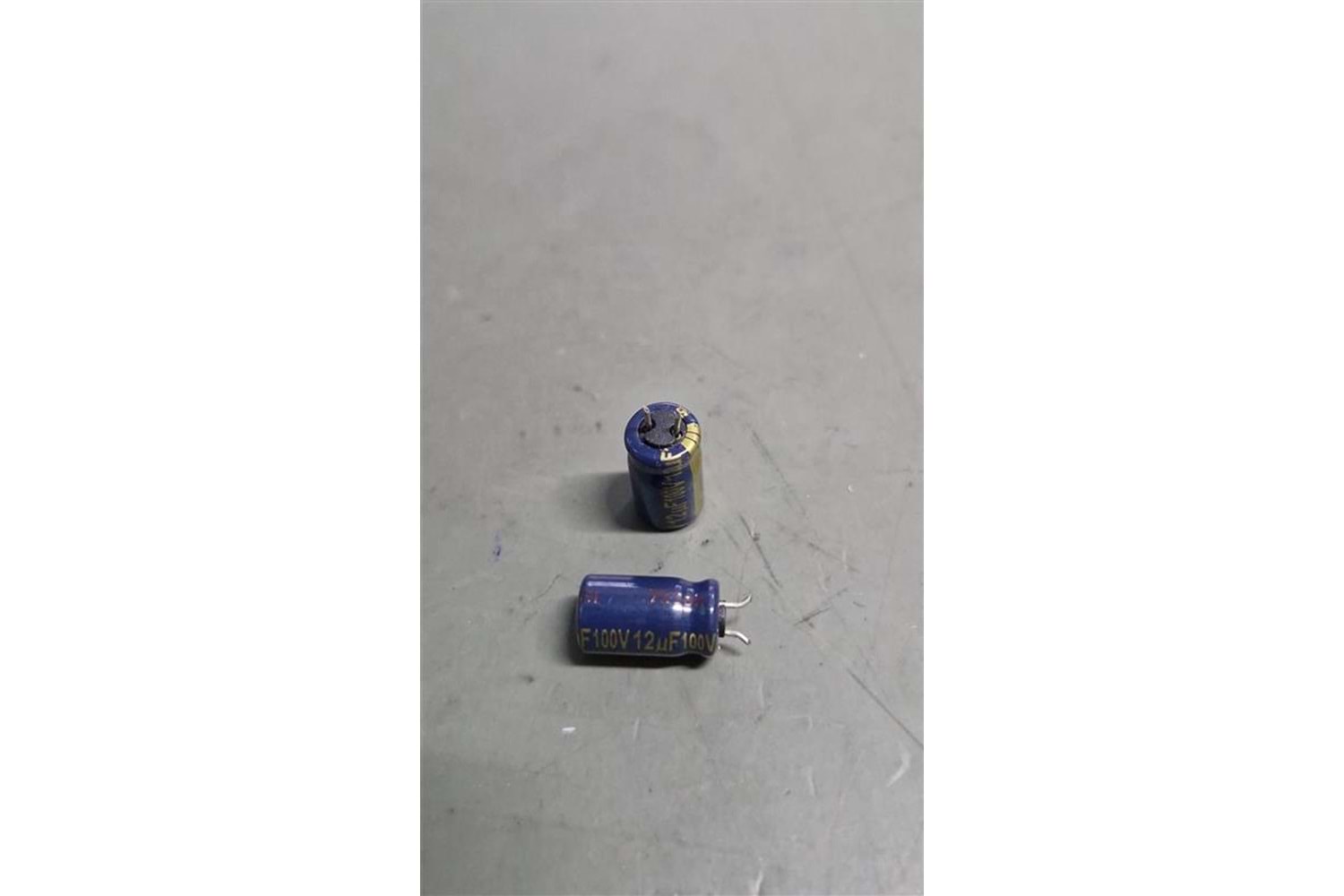 #CAP 12uF 100V 5X7X5MM 1000H THT